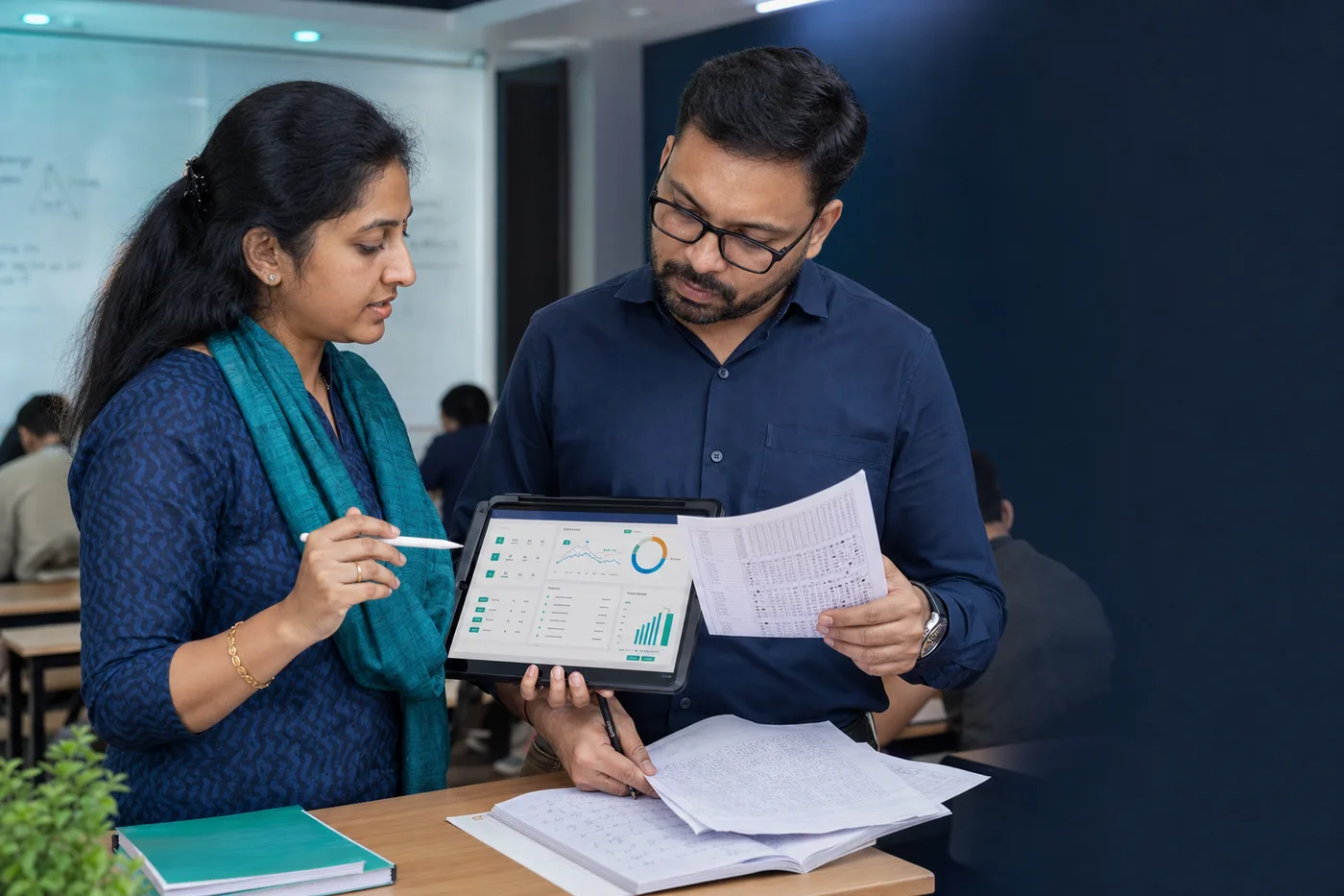 Education professionals reviewing examination results and analytics